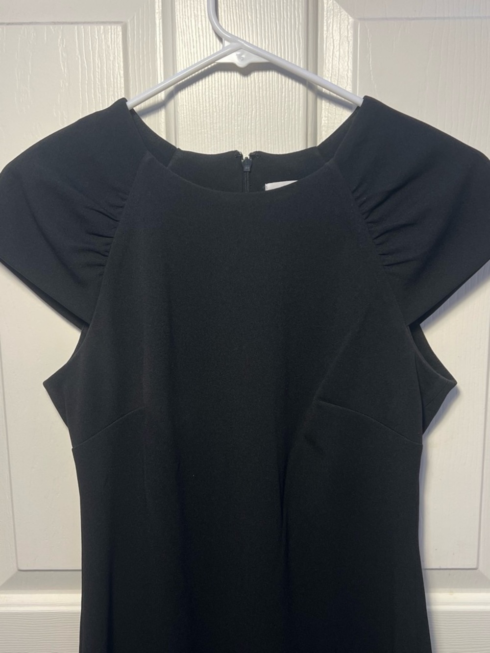 Black short sleeve dress with ruffle detail